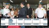 El vicegobernador y vicepresidente del PJ de Entre R&iacute;os, Jos&eacute; C&aacute;ceres, tom&aacute;ndole juramento a Massuh (izq.) en diciembre de 2011. Ad&aacute;n Bahl y Rosatelli miran la escena (der.).